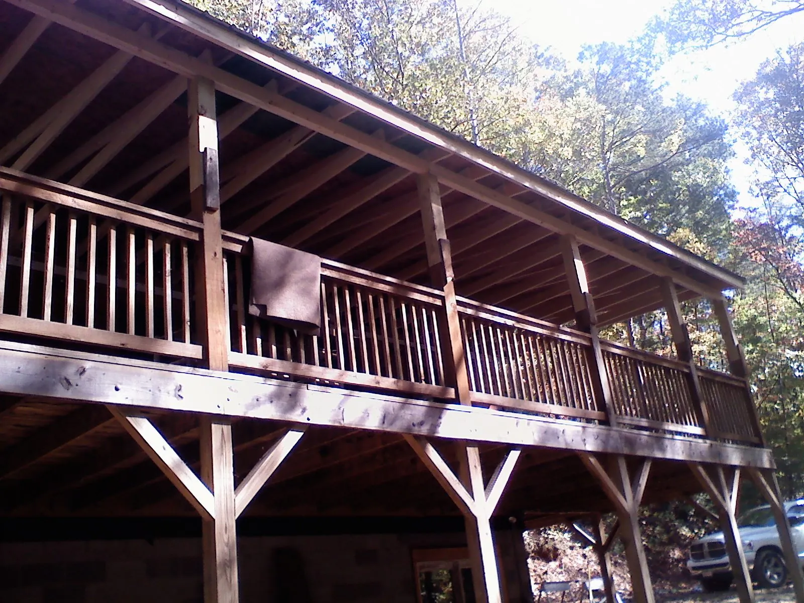 Timber framing under a new elevated porch and deck — Roof Leak Repair in Flom by Roofing Brothers